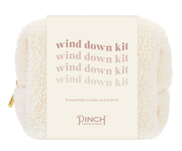White pouch with 'wind down kit' text and 'Pinch Provisions' branding on a white background